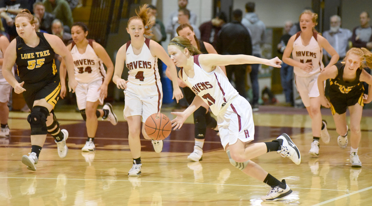 Hillcrest’s Esther Hughes gets a fast break against Lone Tree on Jan. 14.